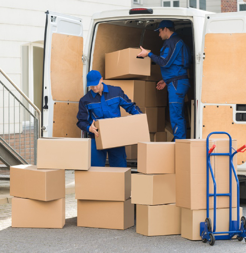 Delivery Men Unloading Boxes On Street